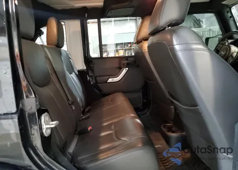 2015 Jeep Wrangler Unlimited Sahara z USA, uszkodzony, nr VIN 1C4BJWEG9FL700993